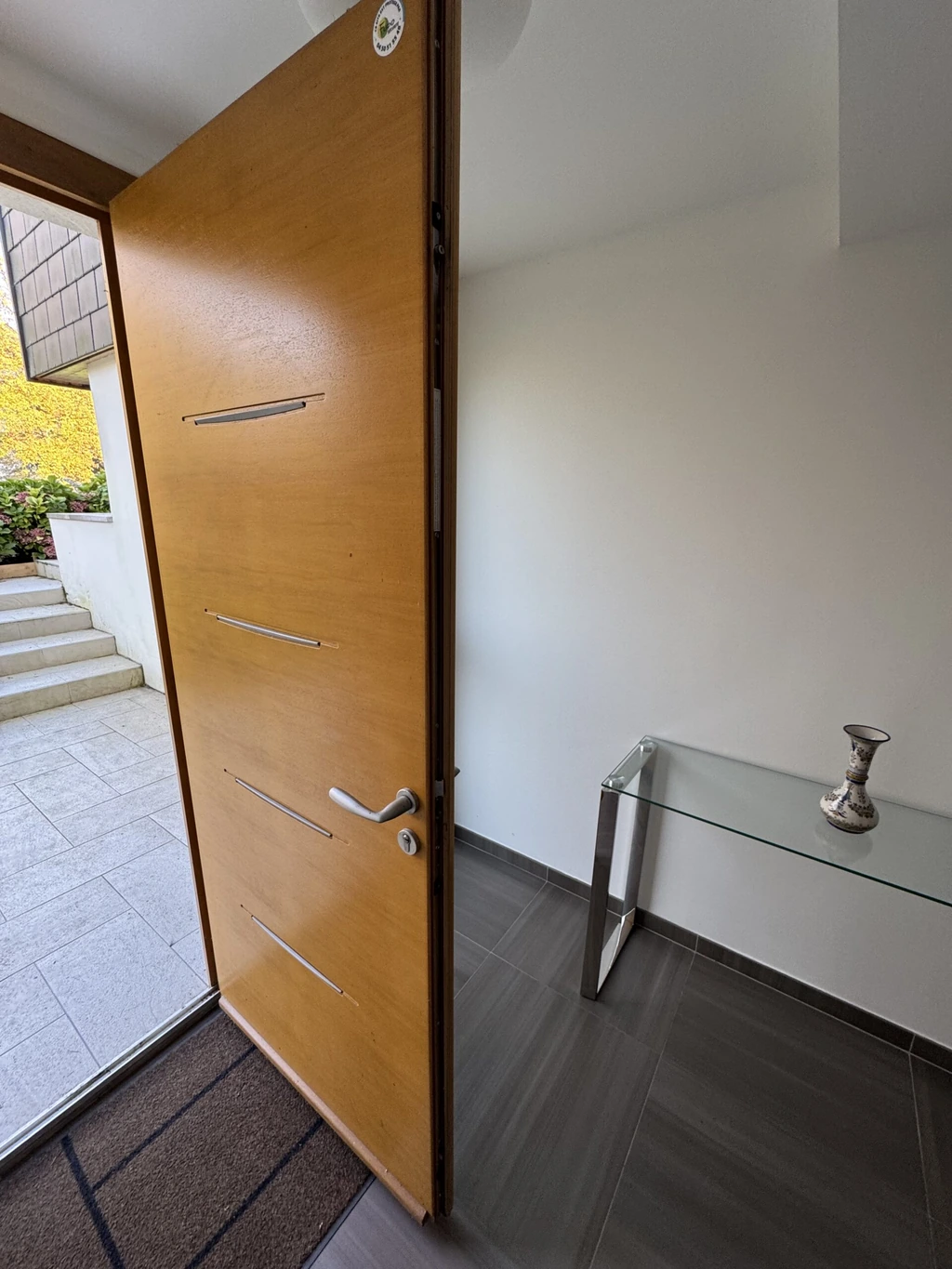 Wooden front door fitted: completed by MULTISECU.