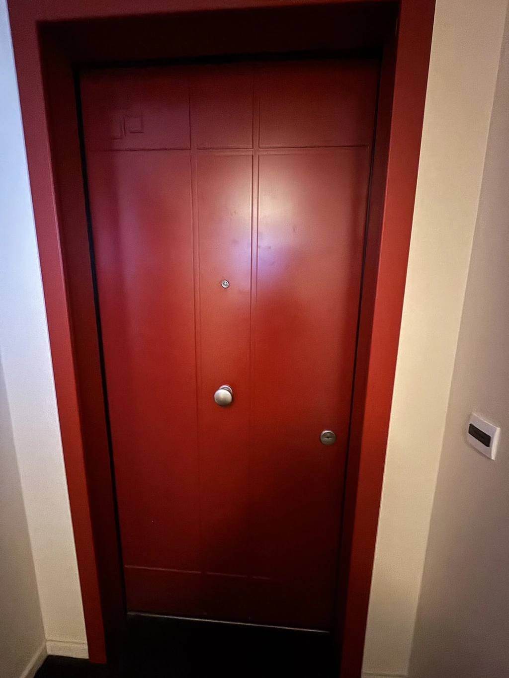 Red entrance door with handle and cylinder — MULTISECU