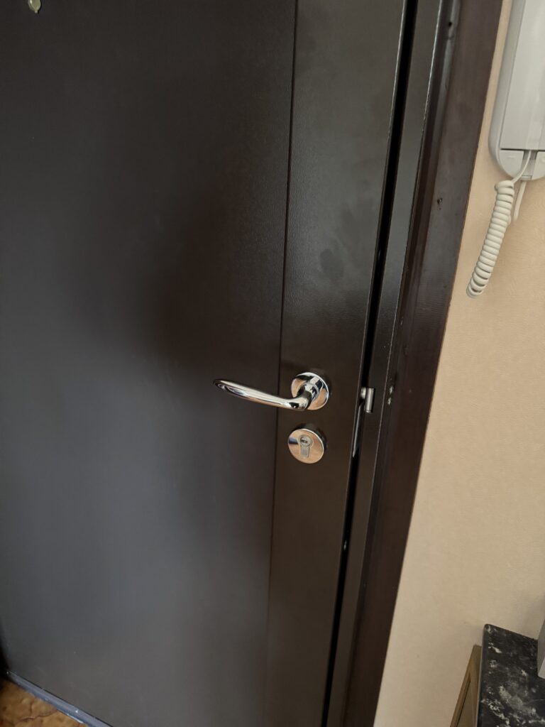 Full-length covered multipoint lock — dark finish